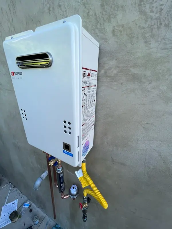 Tankless water heater installation for Whitney homes